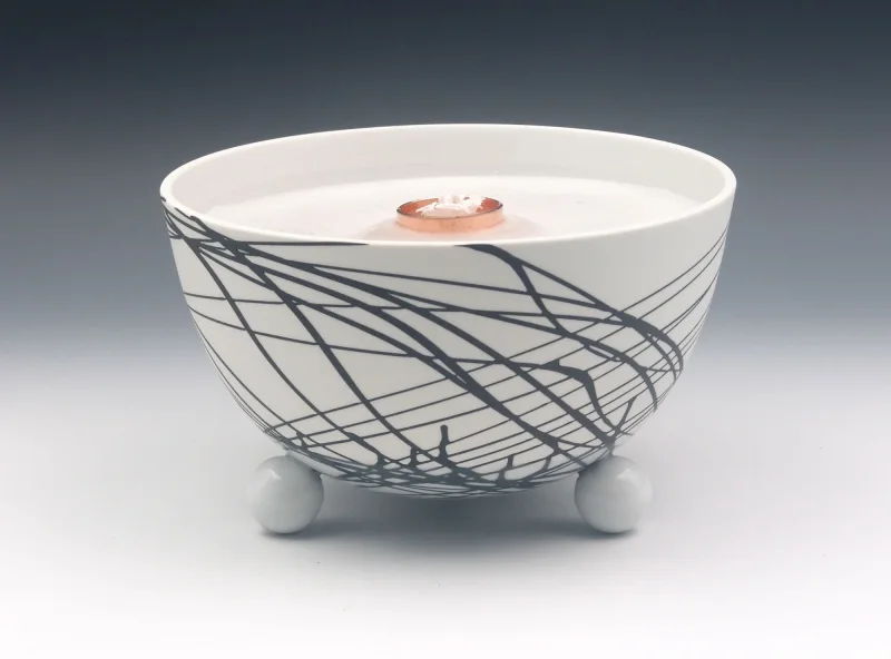 Schmelzlicht aus edlem Porzellan für drinnen und draußen