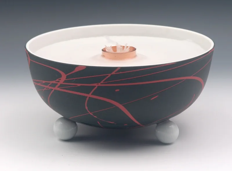 Schmelzlicht aus edlem Porzellan für drinnen und draußen