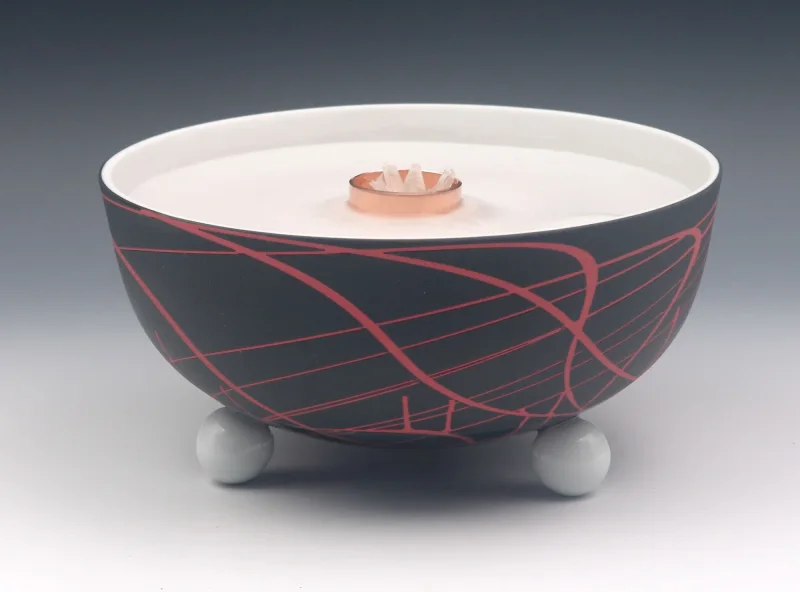 Schmelzlicht aus edlem Porzellan für drinnen und draußen