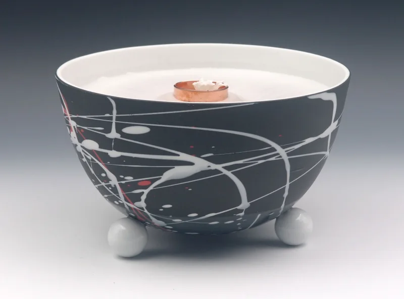 Schmelzlicht aus edlem Porzellan für drinnen und draußen