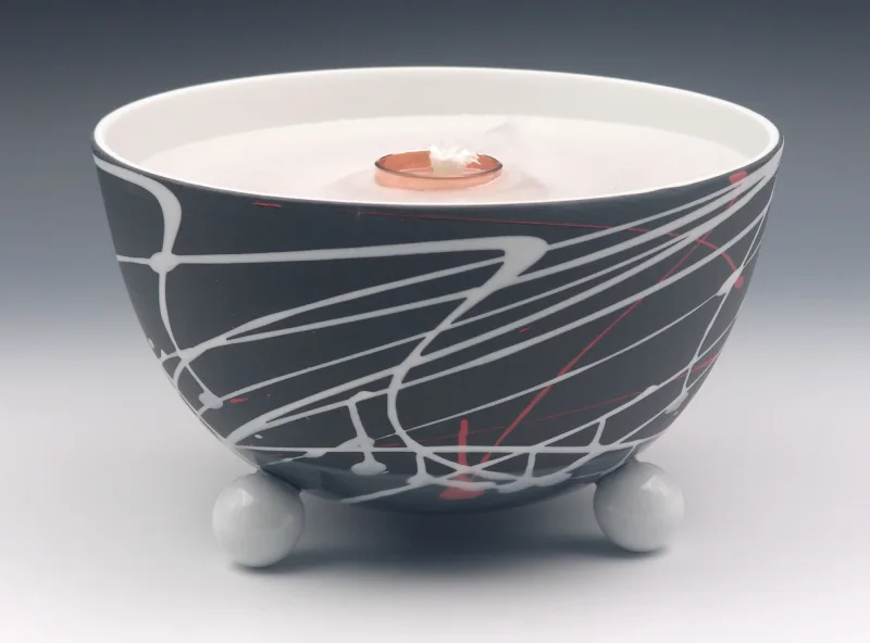 Schmelzlicht aus edlem Porzellan für drinnen und draußen