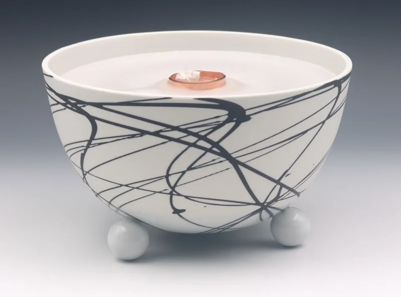 Schmelzlicht aus edlem Porzellan für drinnen und draußen