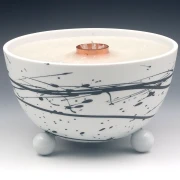 Schmelzlicht aus edlem Porzellan für drinnen und draußen